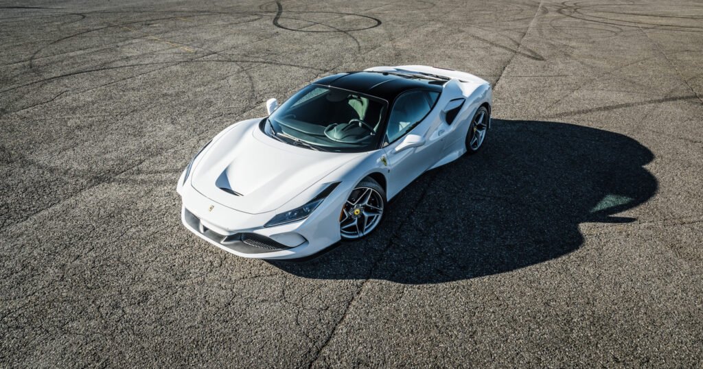 Ferrari with ceramic window tint in dark studio